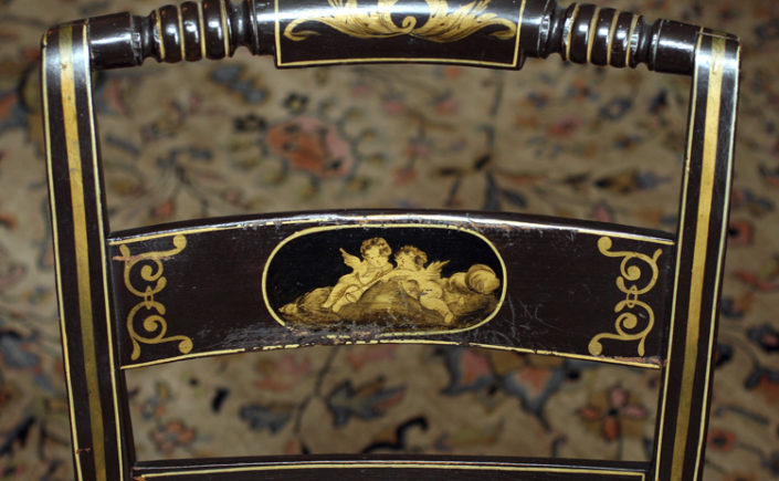 Detail of the back of an early American painted "fancy chair"