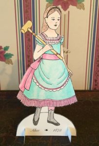 Paper doll of Alice T. Miner as a girl