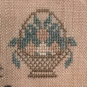 Cross-stitched basket of flowers